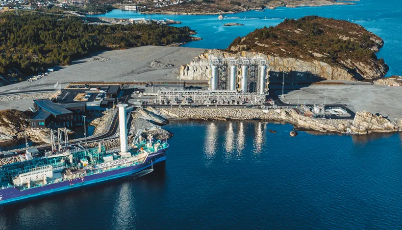 Vessel in front of a storage facility