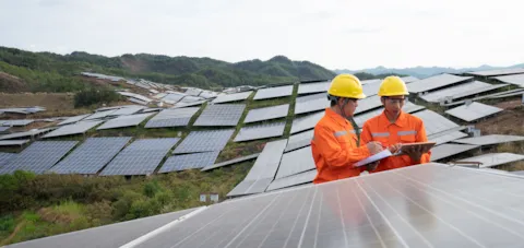 Surveyors at solar plant