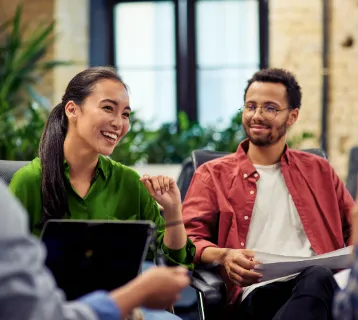 colleague discussion on synergi life software in office