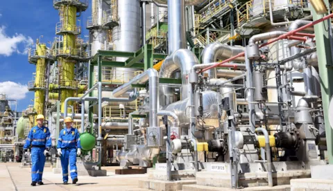 plant facility with two workers